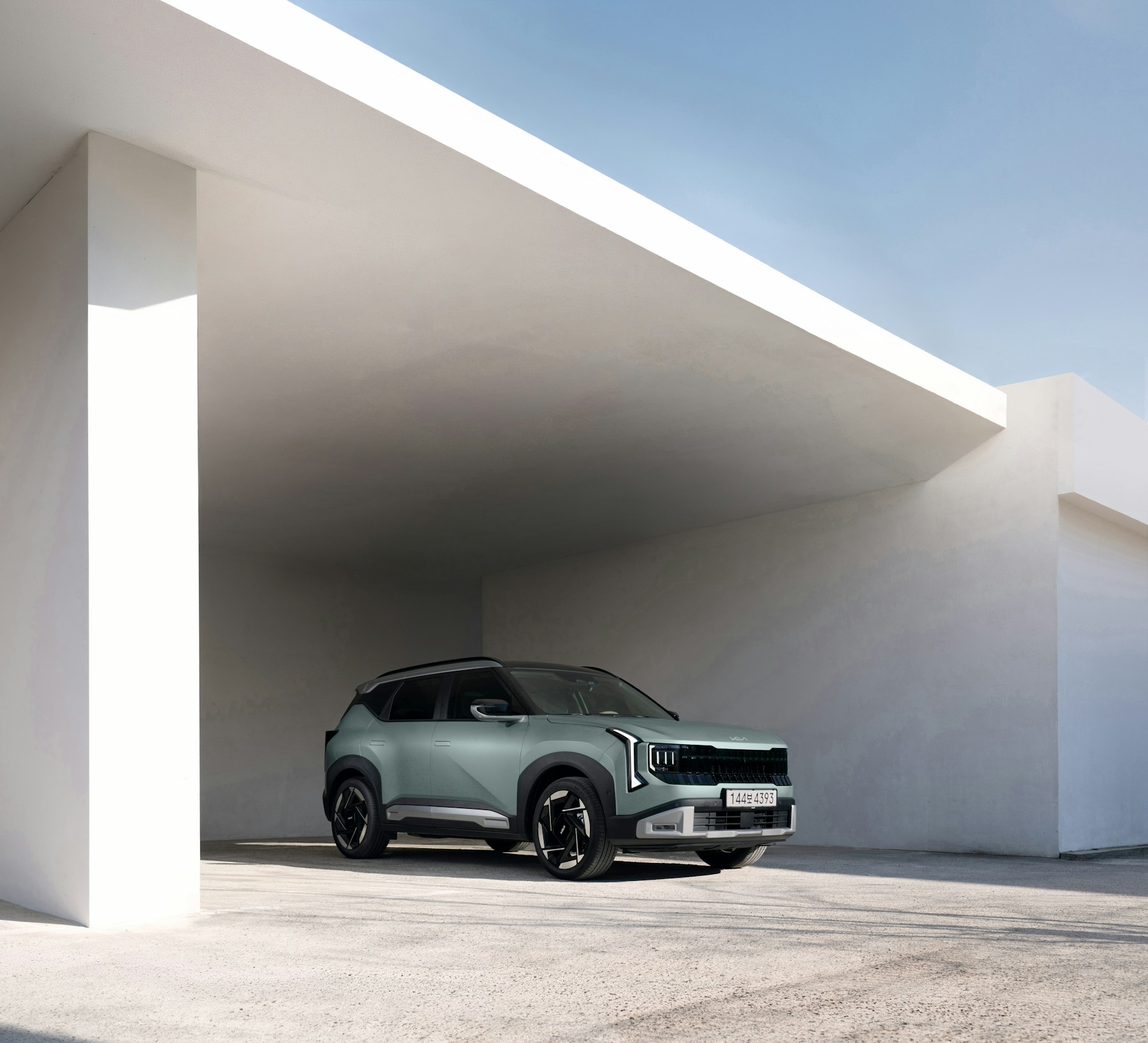 A new compact SUV parked under a plain white concrete canopy. Illustrative photography — not a vehicle held, offered for sale, or priced by Automotive Car Brokers.